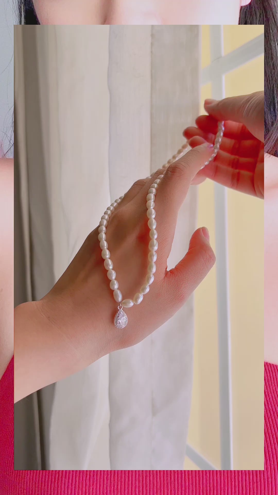 video of model wearing Adele Pearl Chain Necklace