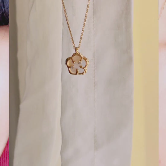 video of modeal wearing 18k gold vermeil medallion necklace