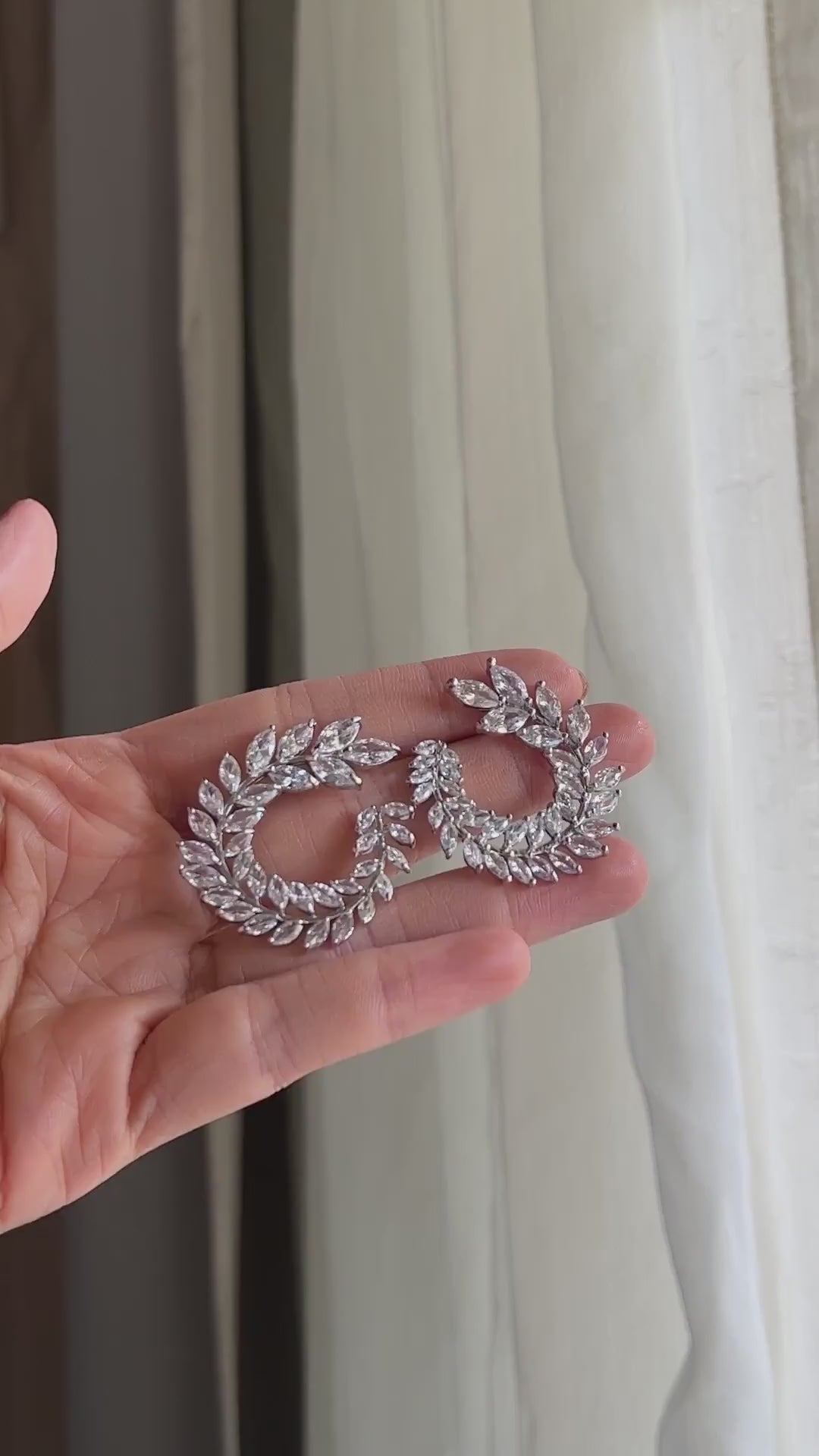 Video of model wearing Aurelia Cubic Zirconia Stud Earrings