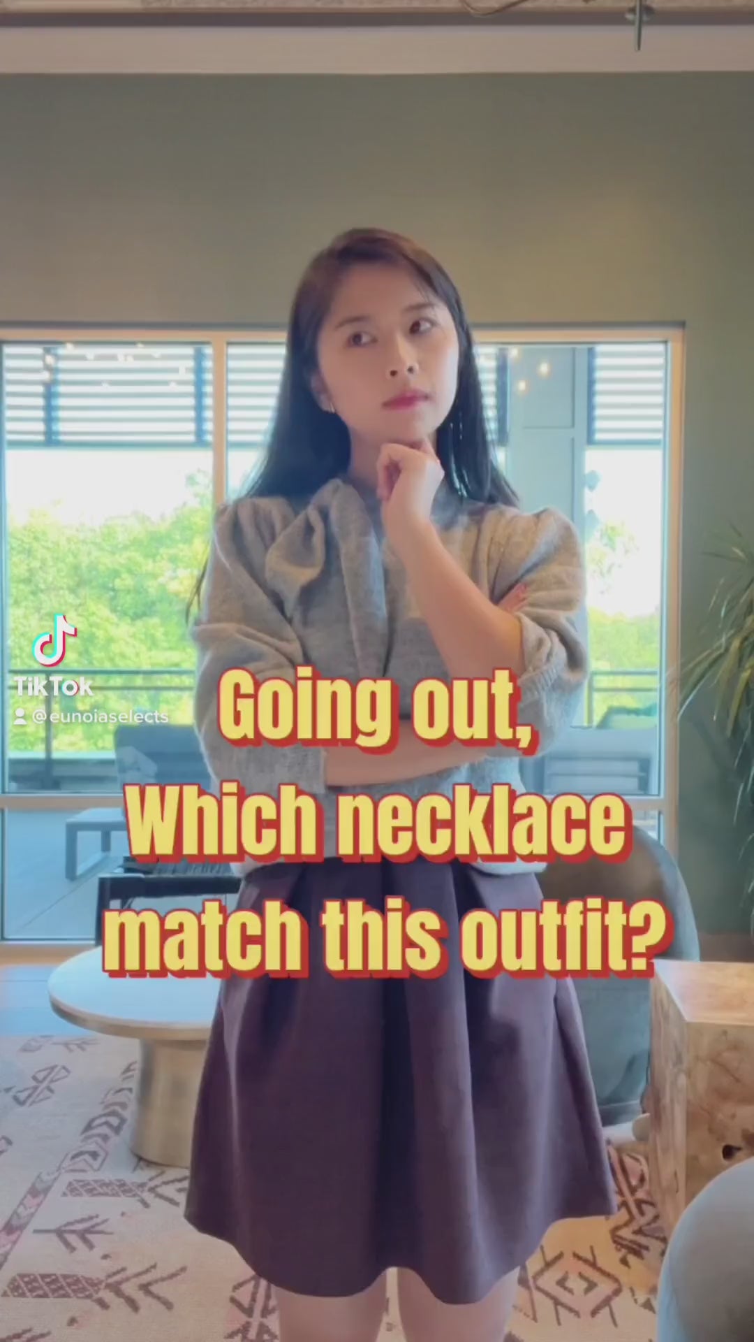 video of model wearing vintage gold coin necklace