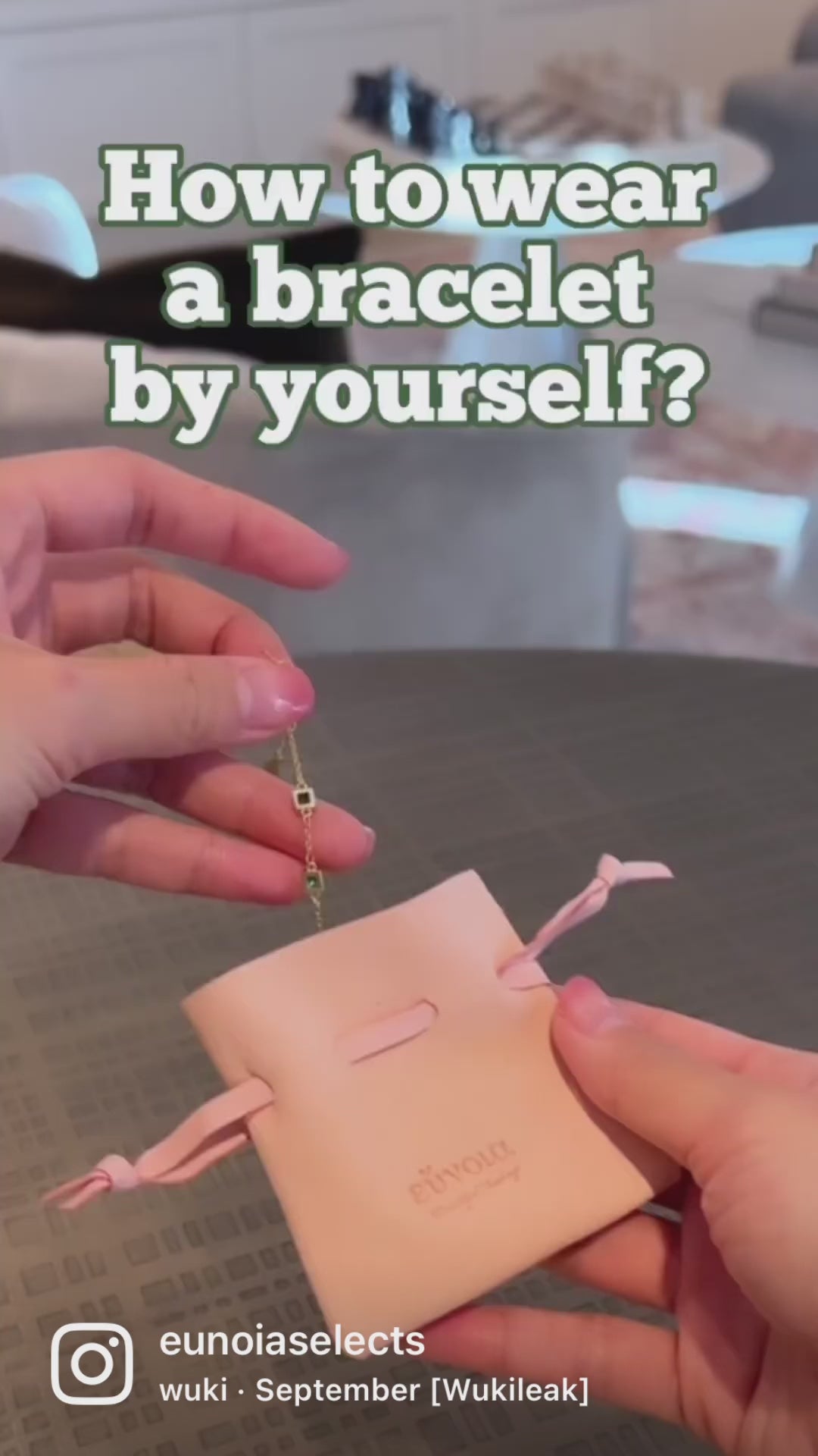 Video showing how to wear emerald green bracelet with household objects 